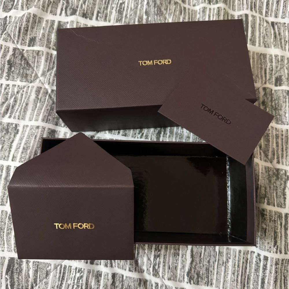 Tom Ford eyeglasses’ box with an envelope